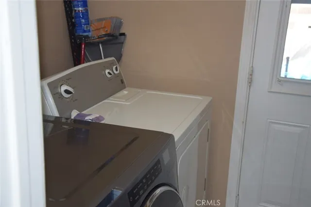 a bathroom with a shower vanity and a mirror
