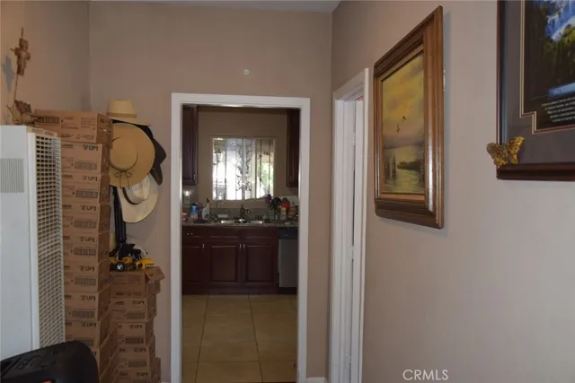 a bathroom with a granite countertop sink a mirror and vanity