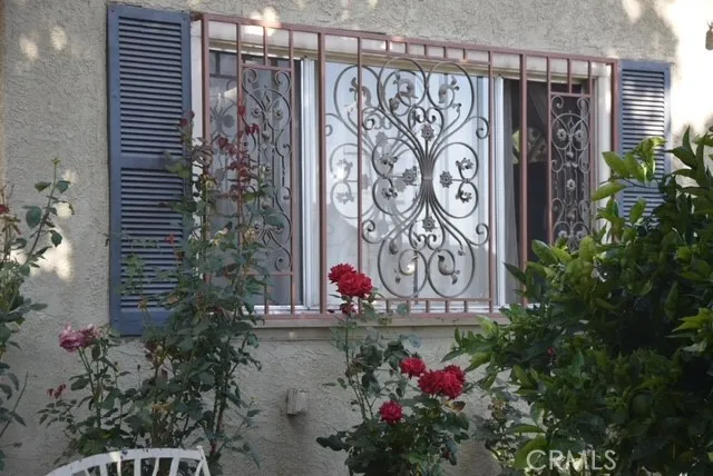 a view of sign board with flowers