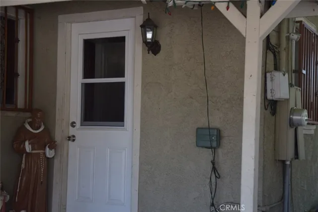 a house with a tree in front of it