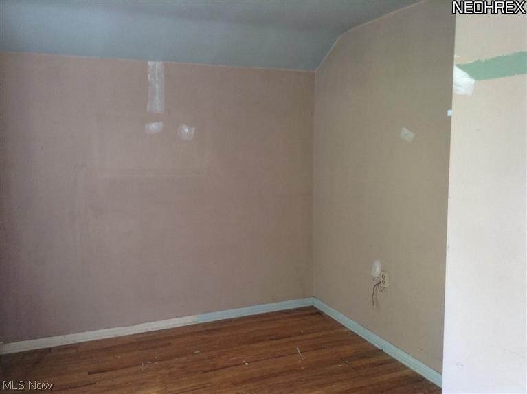 43725 Middle Ridge Road Lorain, OH 44053 - Photo 21 of 25 Bedroom 3 with wood floor