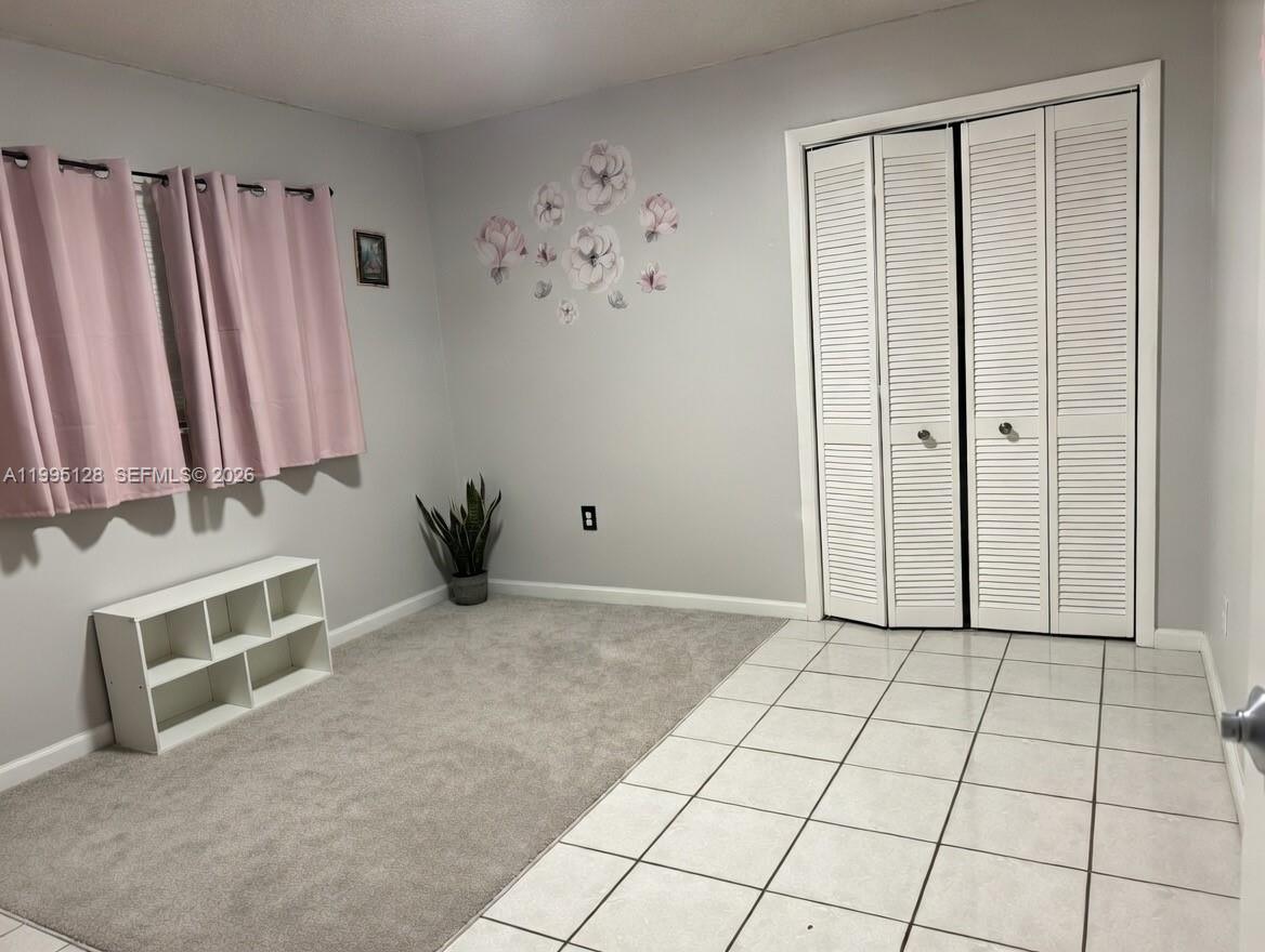 7440 Southwest 22nd Street, Unit 1 Miami, FL 33155 - Photo 12 of 16 3rd bedroom, it fits a queen bedroom set.