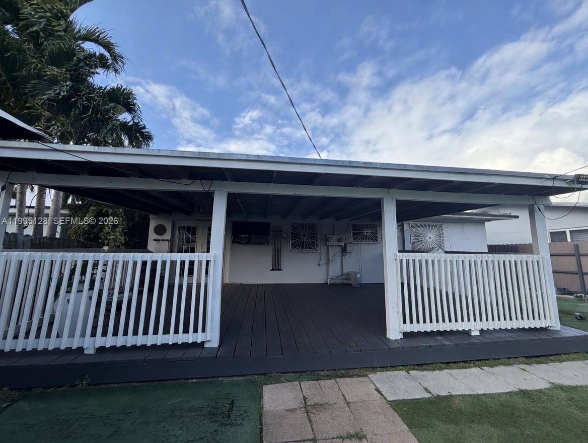 7440 Southwest 22nd Street, Unit 1 Miami, FL 33155 - Photo 15 of 16 Close up of large covered deck!