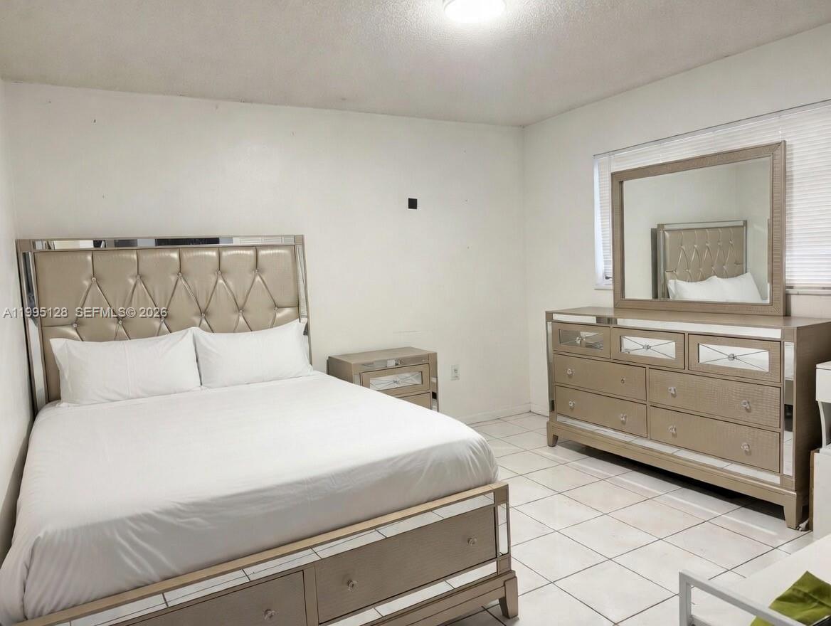 7440 Southwest 22nd Street, Unit 1 Miami, FL 33155 - Photo 10 of 16 2nd bedroom, it fits a queen size bedroom set.