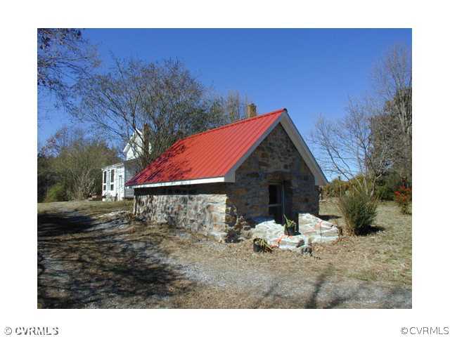 5821 Cox Road Wilsons, VA 23894 - Photo 11 of 12 a view of a house with a yard