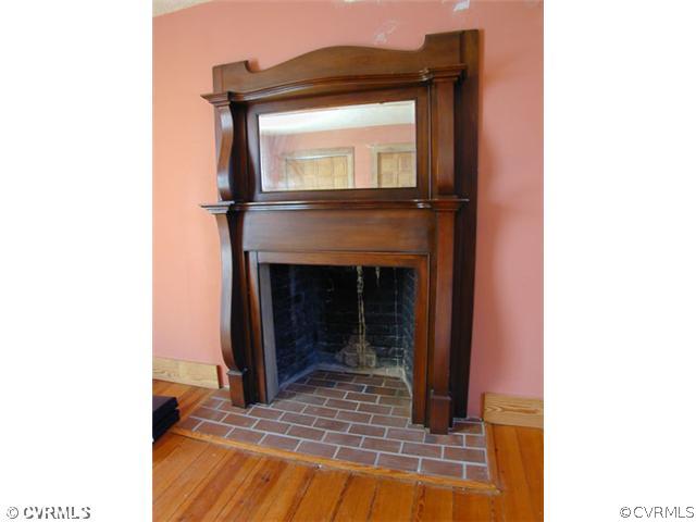5821 Cox Road Wilsons, VA 23894 - Photo 4 of 12 a view of living room with a fireplace