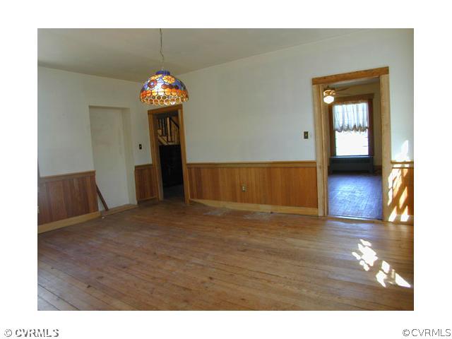 5821 Cox Road Wilsons, VA 23894 - Photo 5 of 12 a view of a livingroom with wooden floor