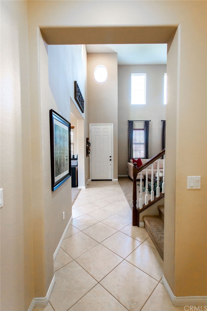 30118 Beeswing Circle Menifee, CA 92584 - Photo 11 of 73 View from the interior Hallway towards the Front Door entry of the home