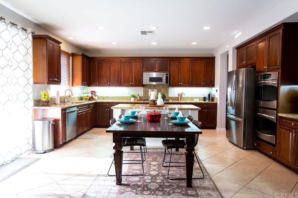 30118 Beeswing Circle Menifee, CA 92584 - Photo 16 of 73 The View from the Family Room into the Large Chefs Kitchen