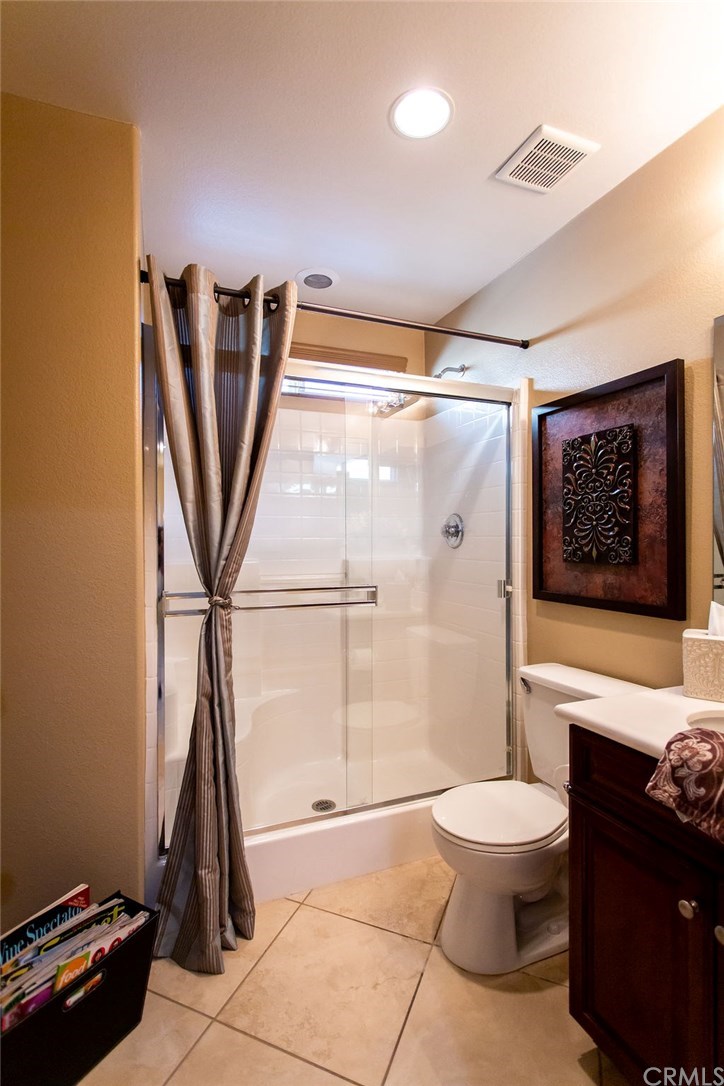 30118 Beeswing Circle Menifee, CA 92584 - Photo 34 of 73 Bathroom Downstairs right next to the Mother In-Law/Guestroom feat. Upgraded easy step in Show with seating space