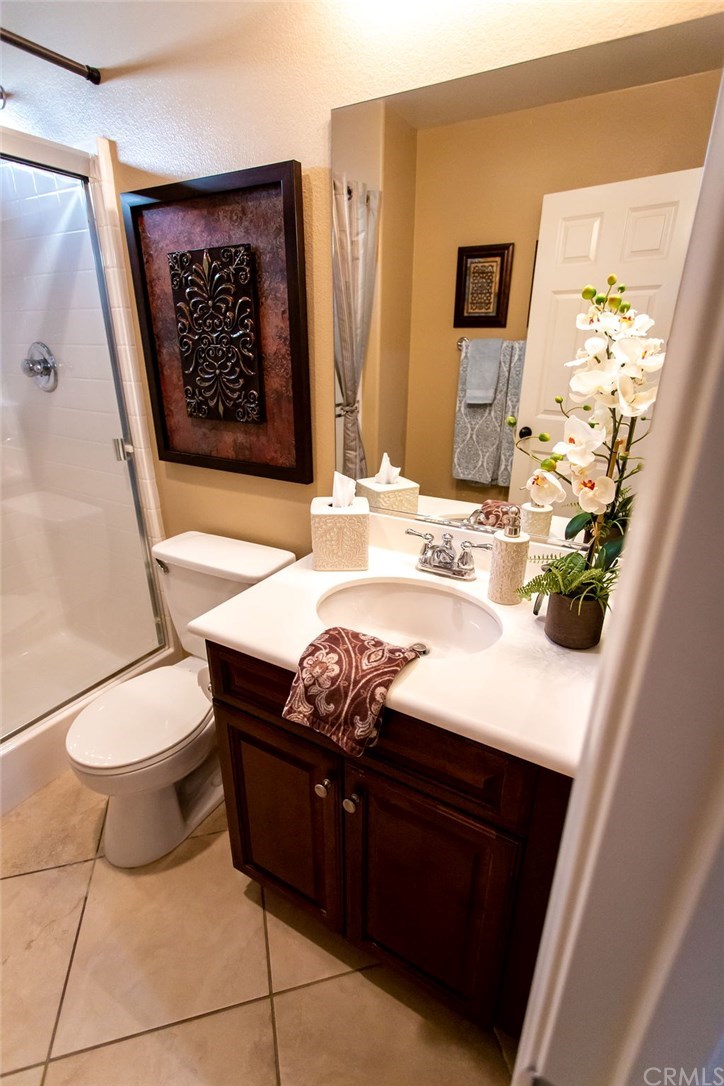 30118 Beeswing Circle Menifee, CA 92584 - Photo 35 of 73 Solid Surface Countertop, Tile Flooring ... Custom Paint -Upgraded Custom Wood Cabinetry.....it just doesn't Stop in this home