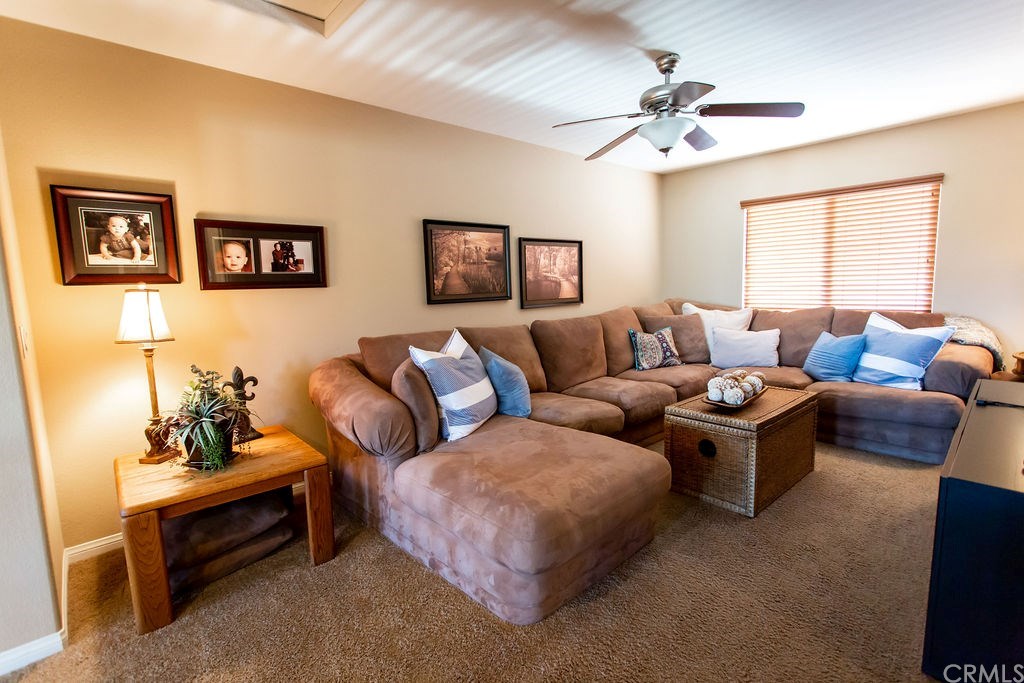 30118 Beeswing Circle Menifee, CA 92584 - Photo 38 of 73 Upstairs Loft with a very Large Sofa for all your Movie watching or Game Playing