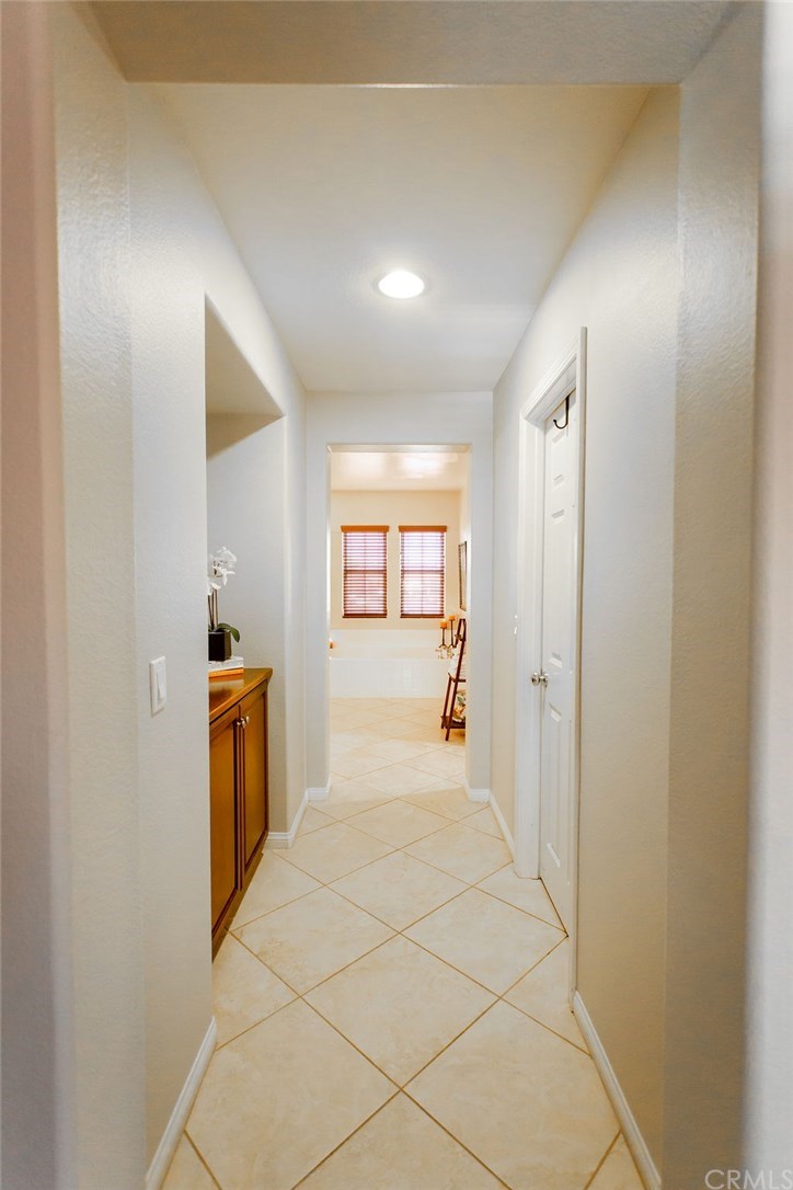 30118 Beeswing Circle Menifee, CA 92584 - Photo 49 of 73 Upgraded Custom Tile Flooring - Linen Storage and 2 Walk in Closets