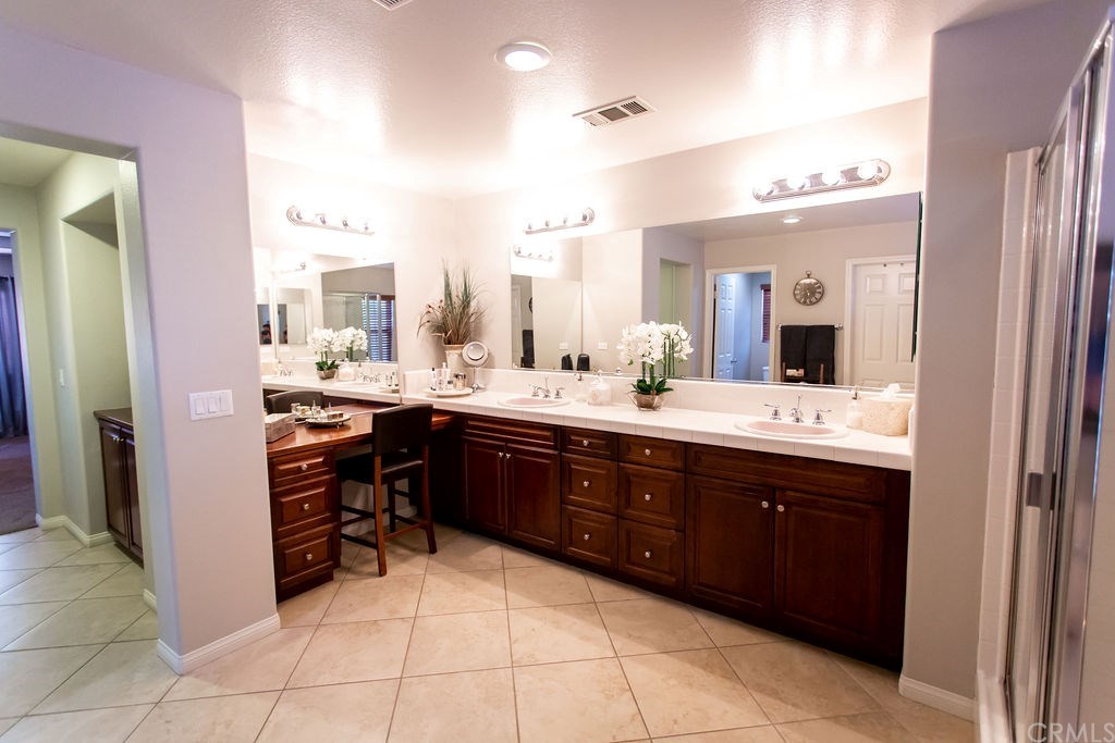 30118 Beeswing Circle Menifee, CA 92584 - Photo 51 of 73 Upgraded Tile Flooring-Dual Sink and Vanity Situation in this Oversized Master Bath Room Suite