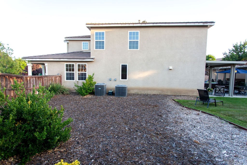 30118 Beeswing Circle Menifee, CA 92584 - Photo 56 of 73 This Side Yard would be 2 Backyards in other Neighborhoods you can also see the Dual Air Condition Units one for Upstairs one for Downstairs for perfect efficiency