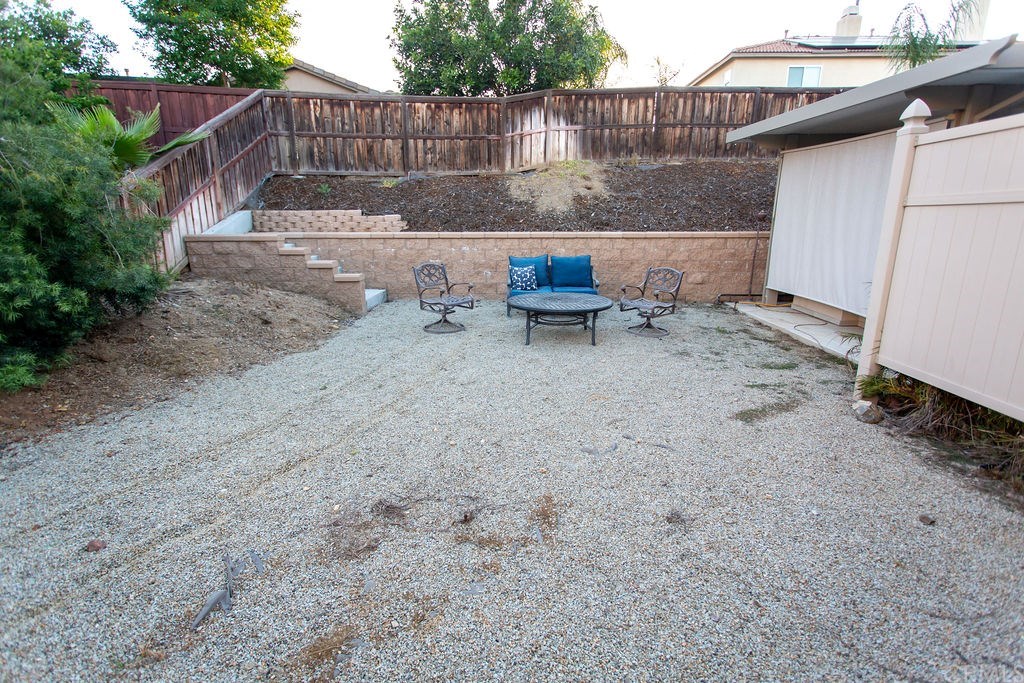 30118 Beeswing Circle Menifee, CA 92584 - Photo 69 of 73 No this is not someone else Backyard this is ADDITIONAL Yard Space ... perfect for all your Green Thumb Projects....... Fresh Vegetables anyone ???