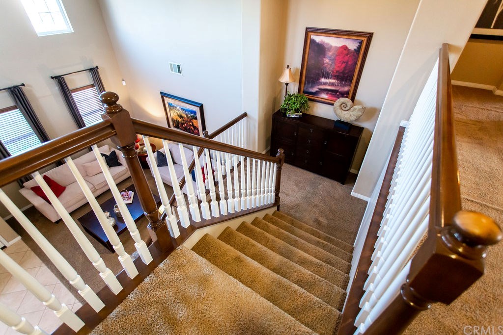 30118 Beeswing Circle Menifee, CA 92584 - Photo 9 of 73 It looks even better from above looking down the family loft is on the right side of this upper banister and also open to below .... photo is coming up .... just keep scrolling ...just keep scrolling