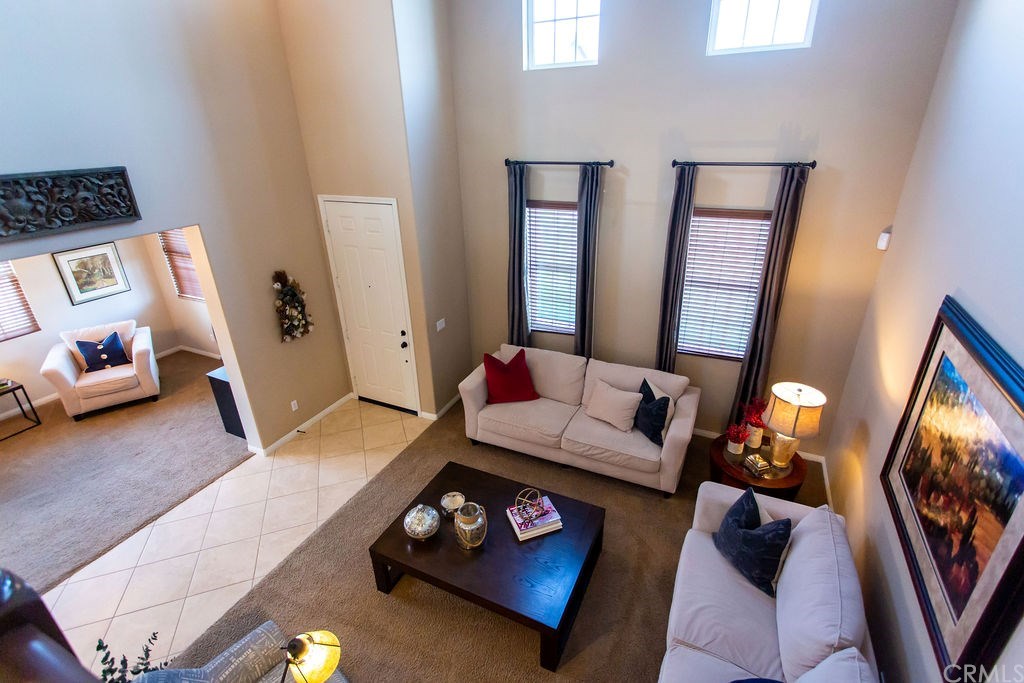 30118 Beeswing Circle Menifee, CA 92584 - Photo 10 of 73 Down view to the Formal Living Room .... Can you see that 20foot Plus Christmas Tree in that Corner ....