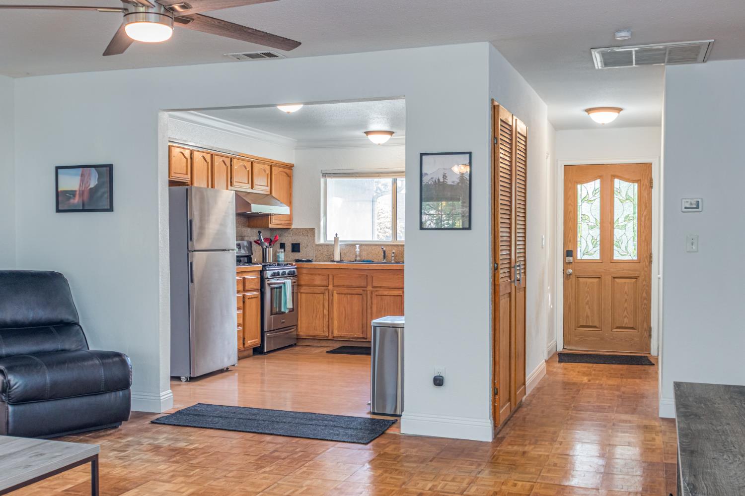 5651 Gerard Way Citrus Heights, CA 95621 - Photo 8 of 31 a view of a kitchen cabinets and wooden floor