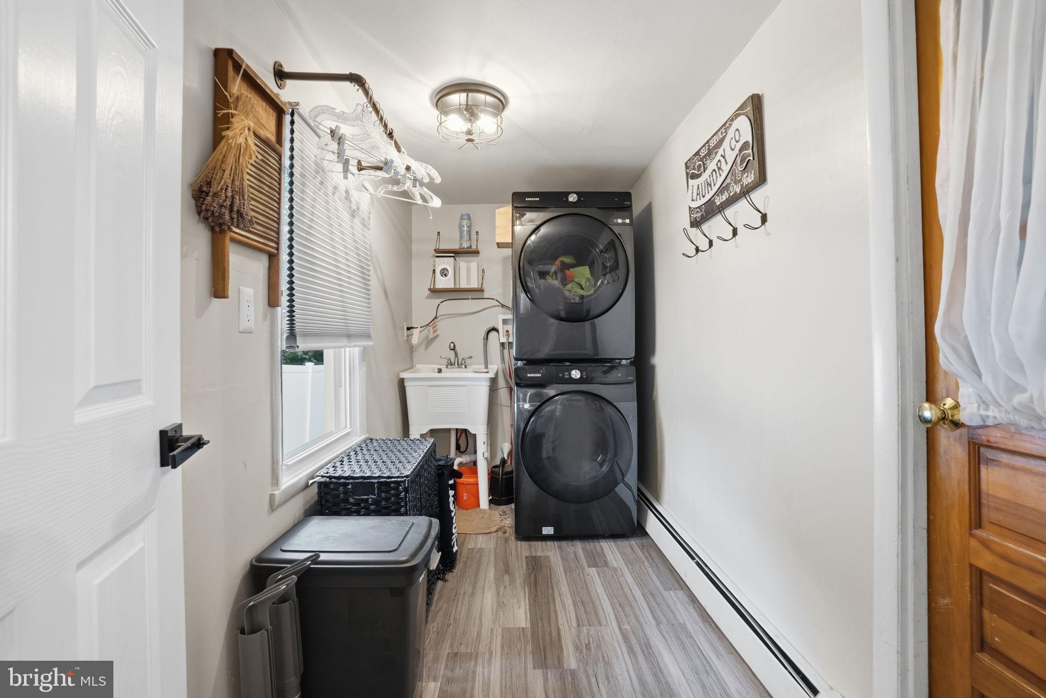 303 Radcliffe Road Glenside, PA 19038 - Photo 24 of 36 a utility room with dryer and washer