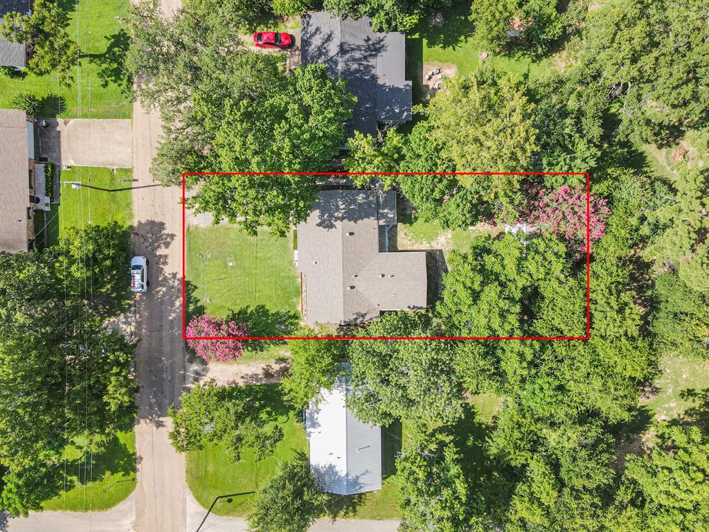 1024 Tower Street Canton, TX 75103 - Photo 26 of 27 an aerial view of a house with a yard and garden