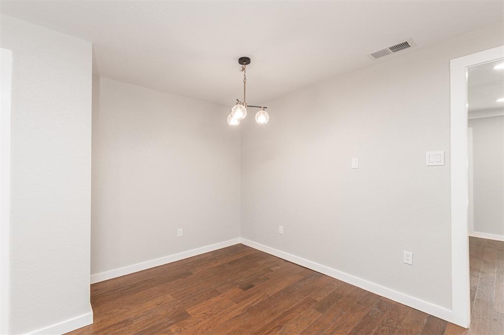 1024 Tower Street Canton, TX 75103 - Photo 8 of 27 a view of a room with wooden floor and ceiling fan