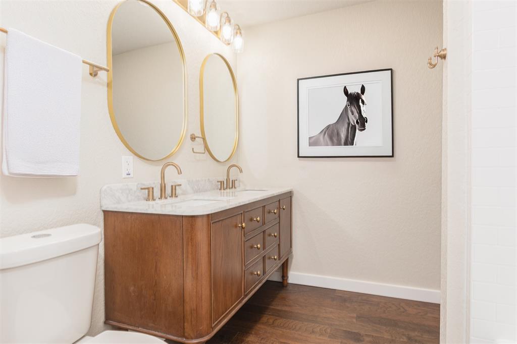 1024 Tower Street Canton, TX 75103 - Photo 10 of 27 a bathroom with a sink and a mirror