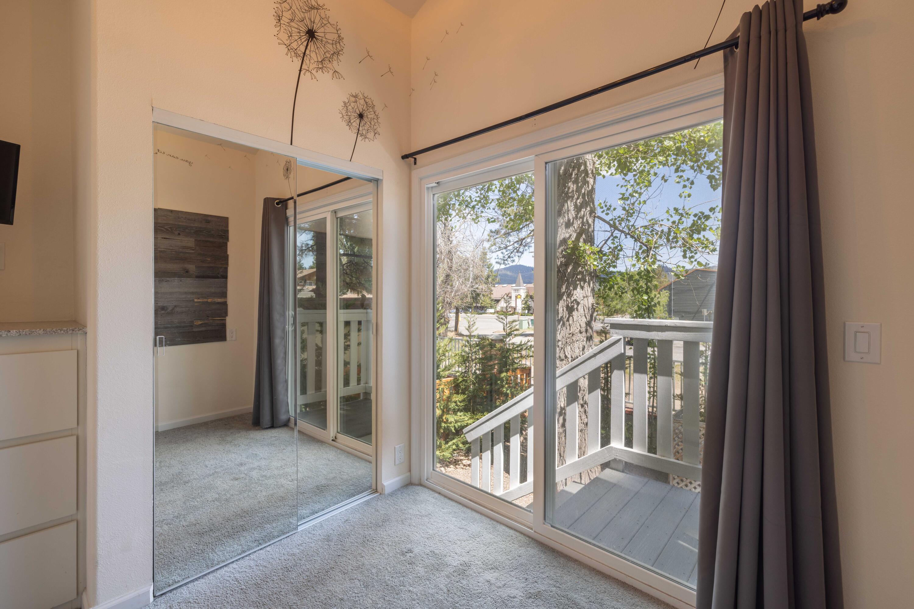 547 Alden Road, Unit RV4 Big Bear Lake, CA 92315 - Photo 17 of 38 a view of a room with an empty space and balcony