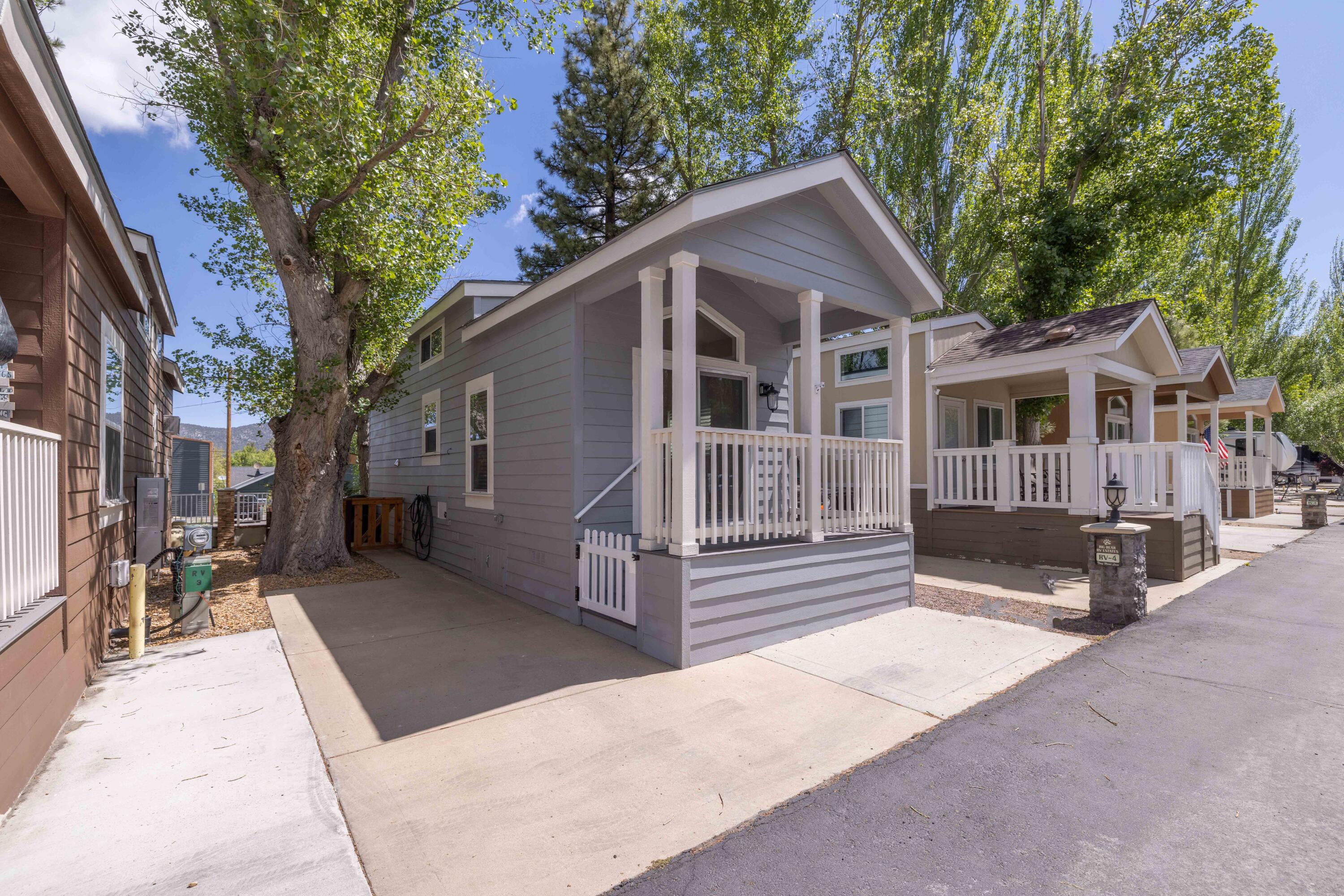 547 Alden Road, Unit RV4 Big Bear Lake, CA 92315 - Photo 2 of 38 a view of a house with a yard