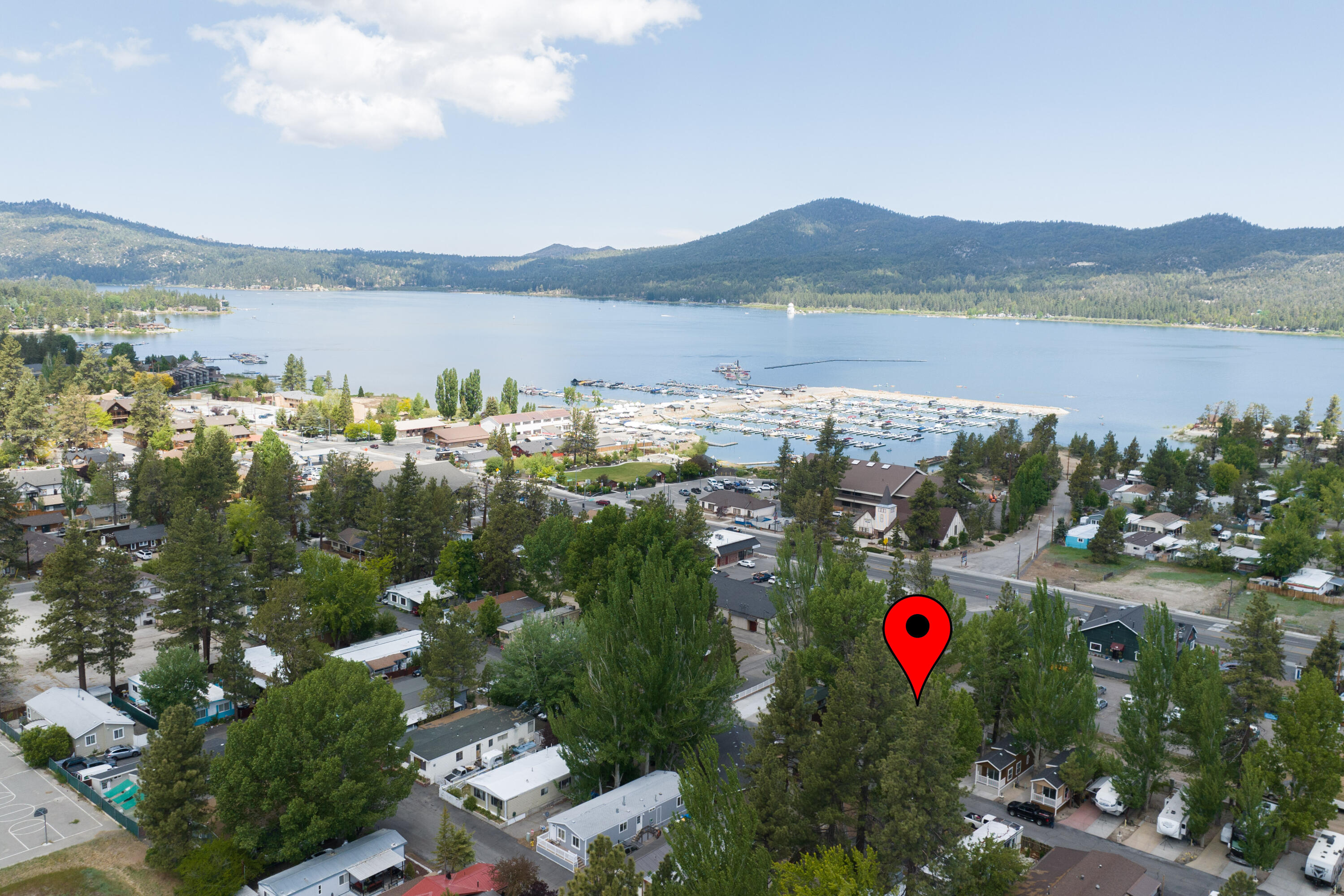 547 Alden Road, Unit RV4 Big Bear Lake, CA 92315 - Photo 3 of 38 a view of a lake with a mountain