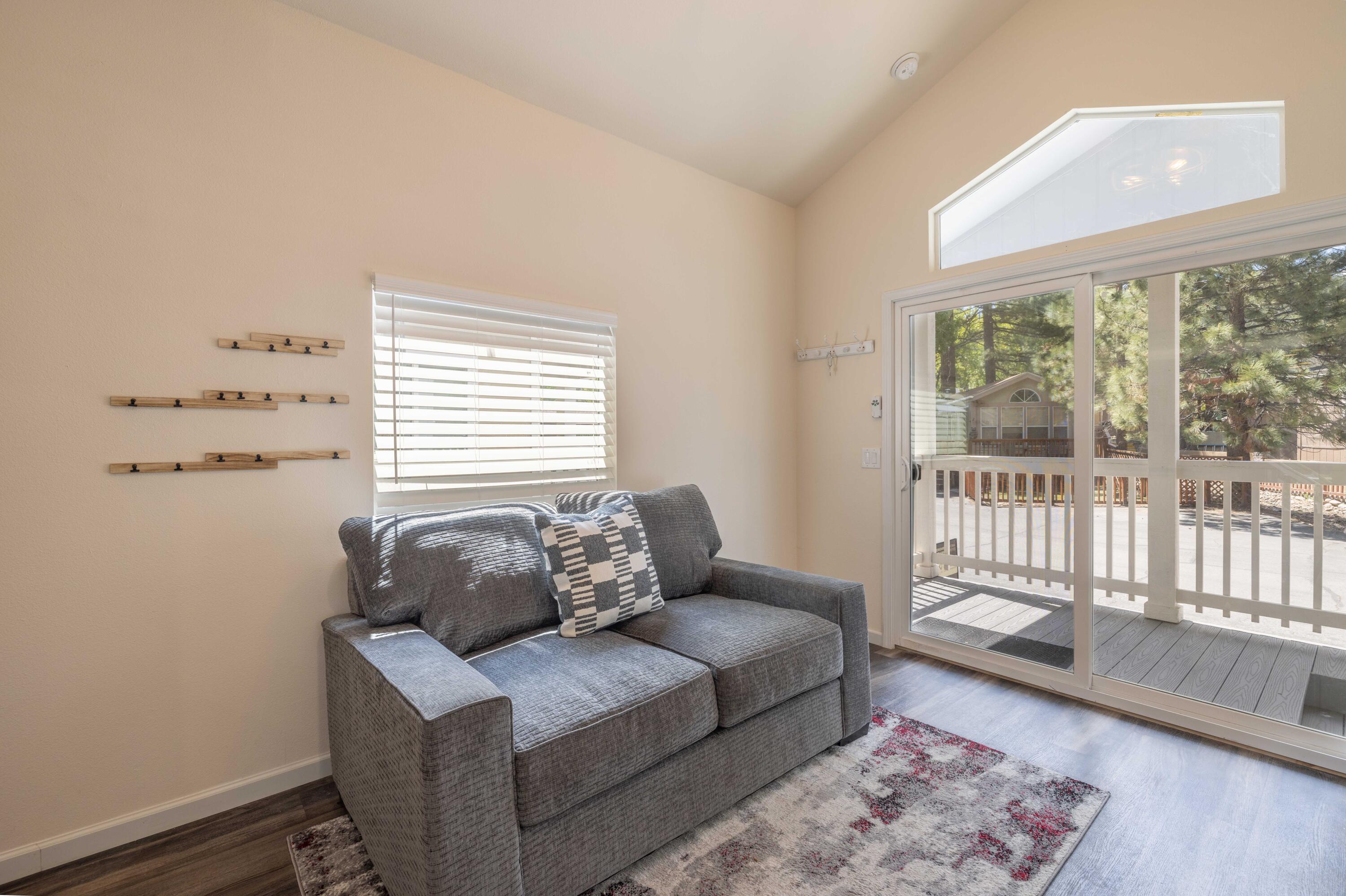 547 Alden Road, Unit RV4 Big Bear Lake, CA 92315 - Photo 9 of 38 a living room with furniture and a large window