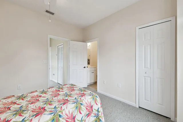 a bathroom with a sink toilet and mirror