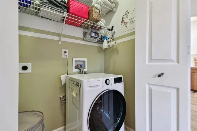 a front view of a house with a garage