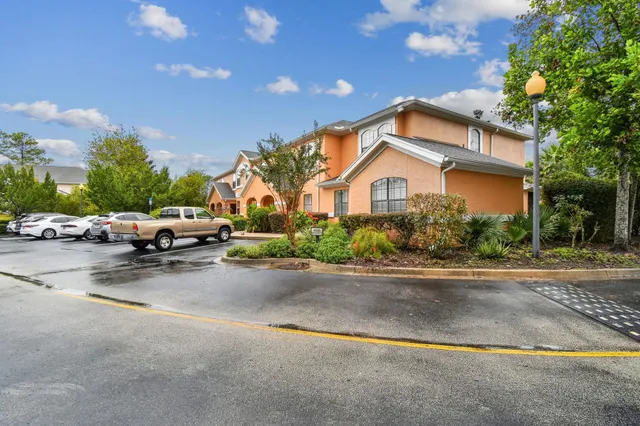 a view of a street with cars on road