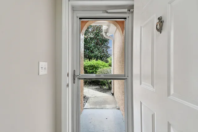 a kitchen with stainless steel appliances a stove a sink and a microwave