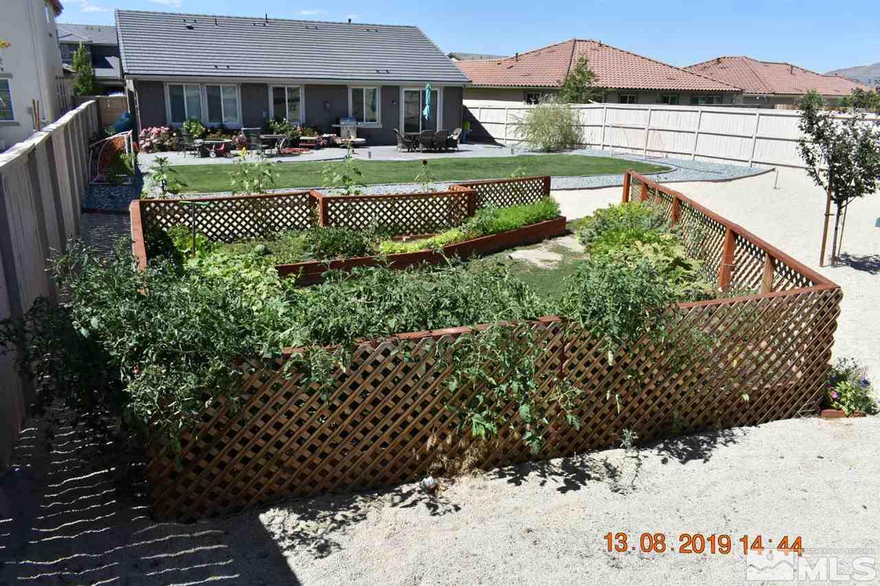 10836 Walnut Ridge Drive Reno, NV 89521 - Photo 12 of 25 a view of a house with a yard