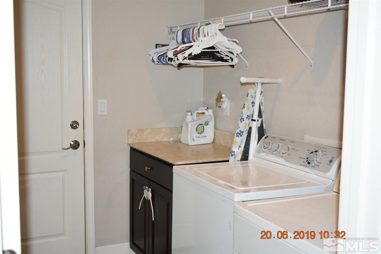 10836 Walnut Ridge Drive Reno, NV 89521 - Photo 13 of 25 a bathroom with a sink and a mirror