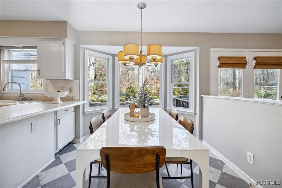 8800 Overhill Road Henrico, VA 23229 - Photo 11 of 33 Breakfast nook and chandelier