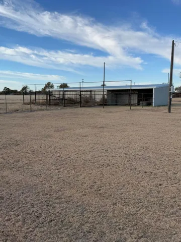 a view of a terrace with yard