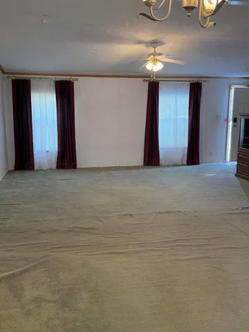 a view of a livingroom with a staircase