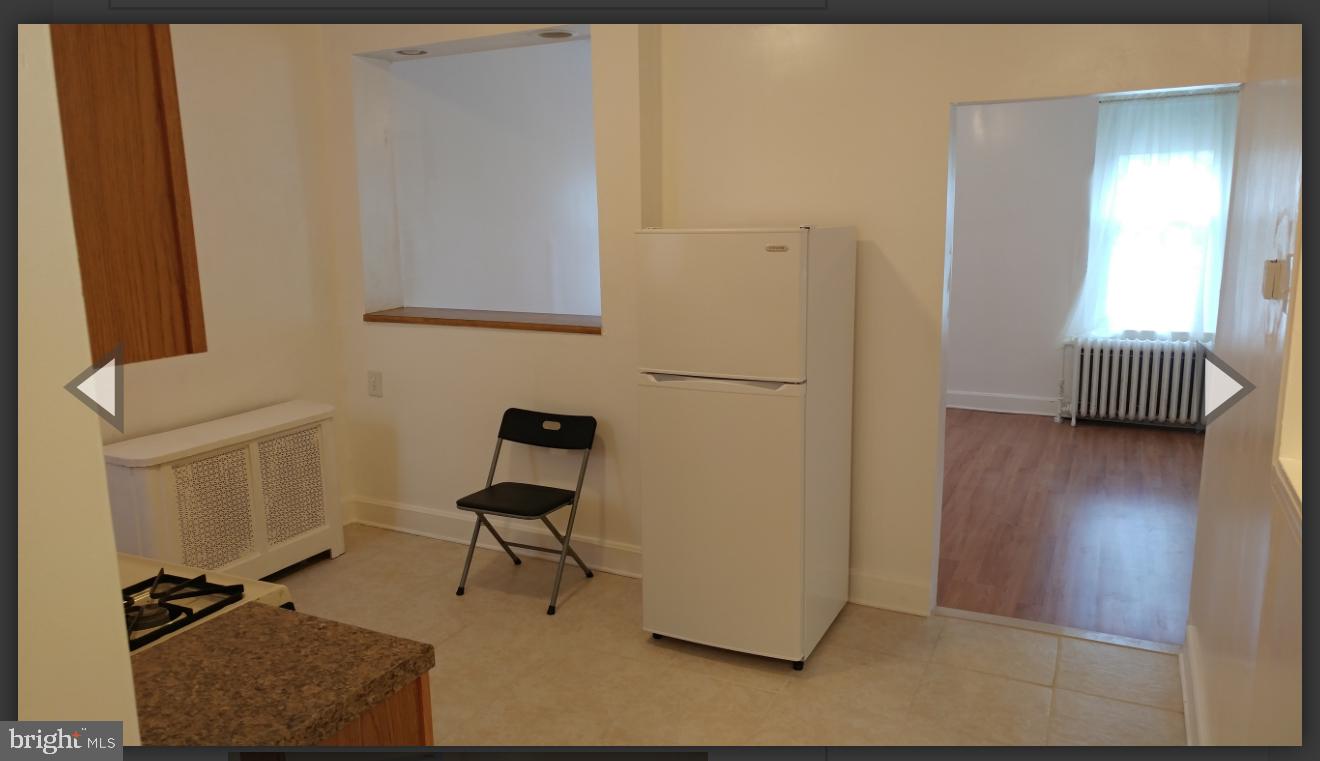 530 West Ritner Street Philadelphia, PA 19148 - Photo 2 of 11 a view of a workspace with furniture and a window