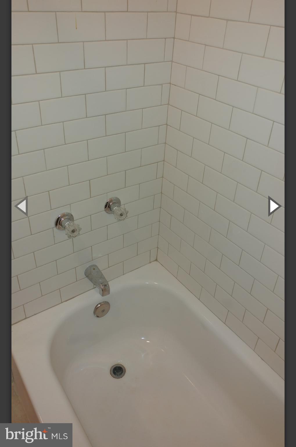 530 West Ritner Street Philadelphia, PA 19148 - Photo 5 of 11 a bath tub sitting in a bathroom