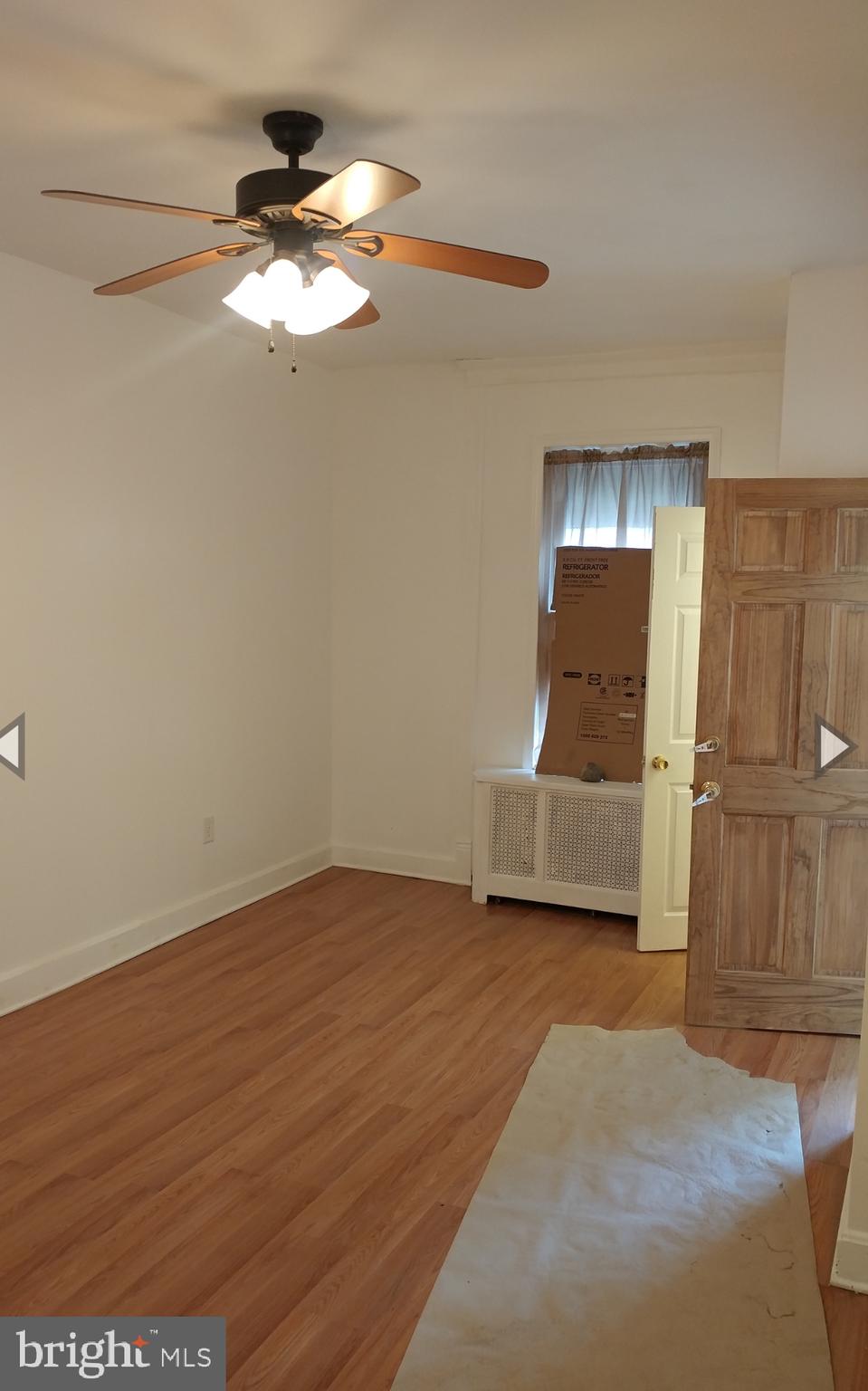 530 West Ritner Street Philadelphia, PA 19148 - Photo 6 of 11 a view of a livingroom with wooden floor