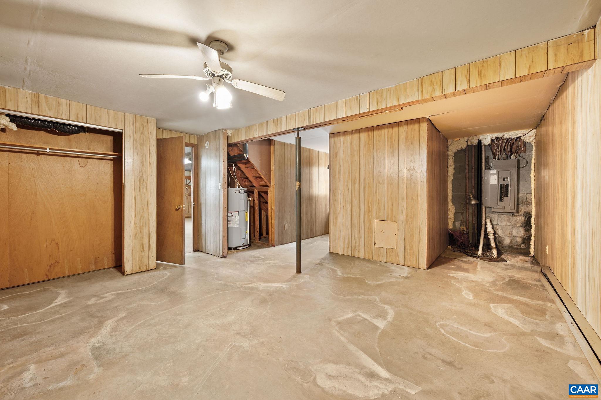 202 Hartmans Mill Road Charlottesville, VA 22902 - Photo 17 of 27 an empty room with closet and a ceiling fan