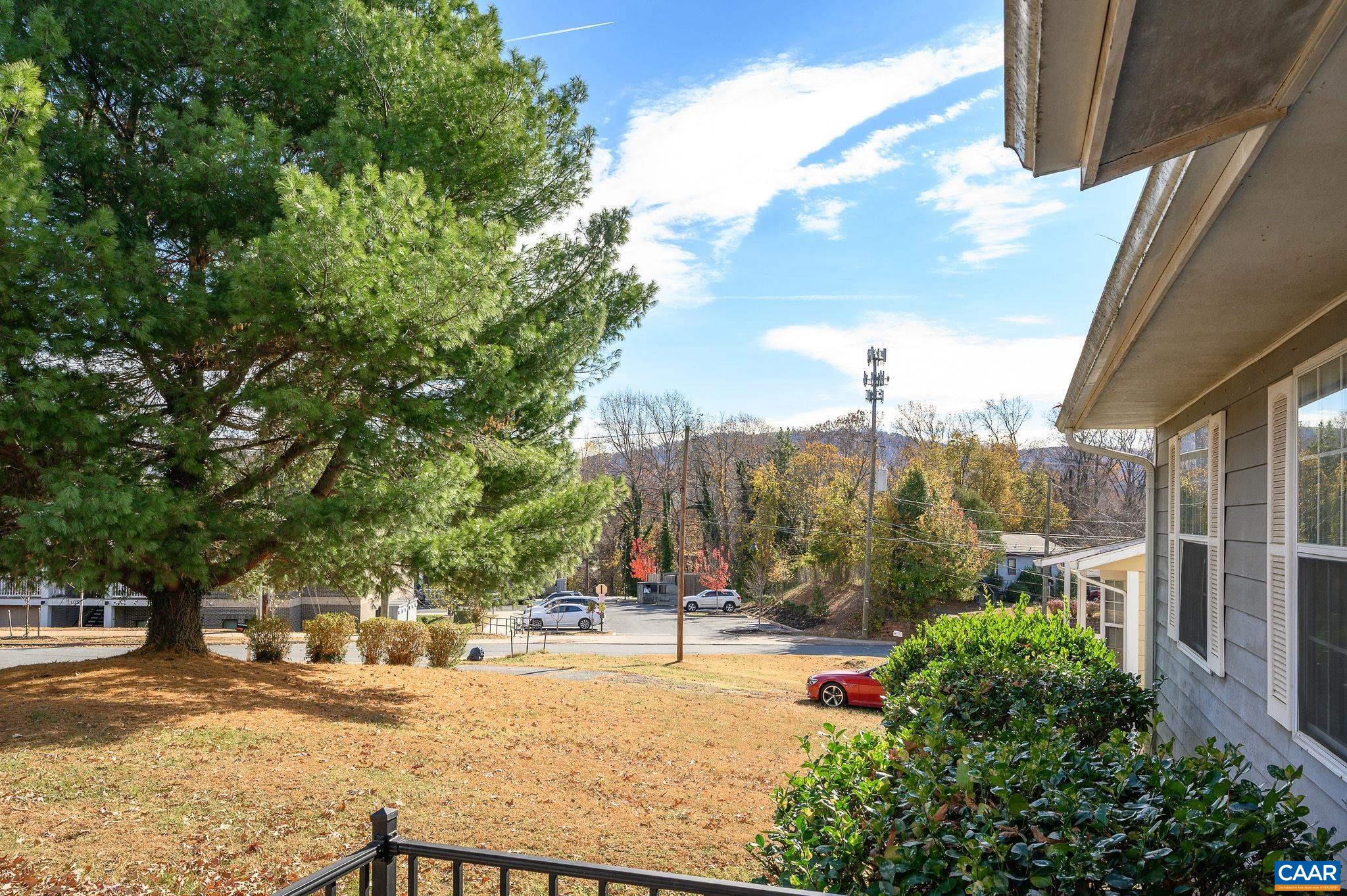 202 Hartmans Mill Road Charlottesville, VA 22902 - Photo 5 of 27 a view of a yard with a tree