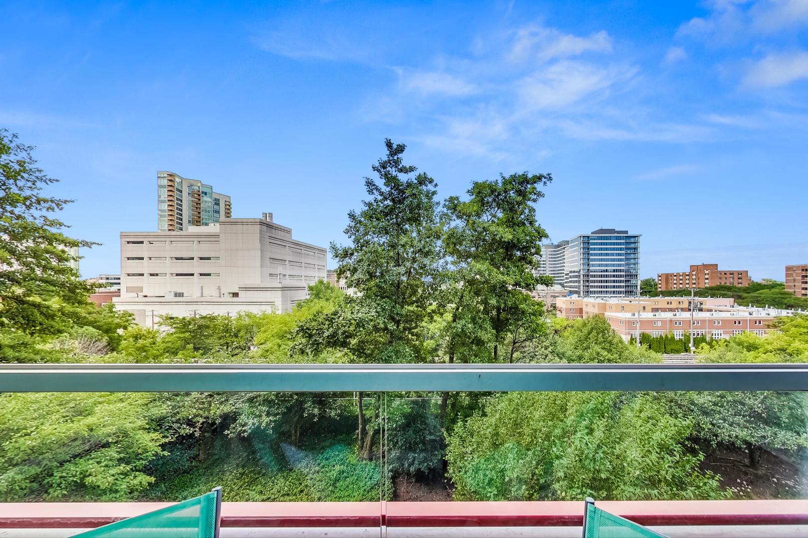 800 Elgin Road, Unit 702 Evanston, IL 60201 - Photo 16 of 16 a view of city from a balcony