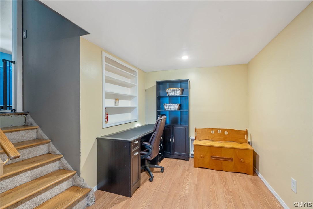4346 Old Meadow Road Clay, NY 13041 - Photo 21 of 33 From the main level, we descend a few steps down t
