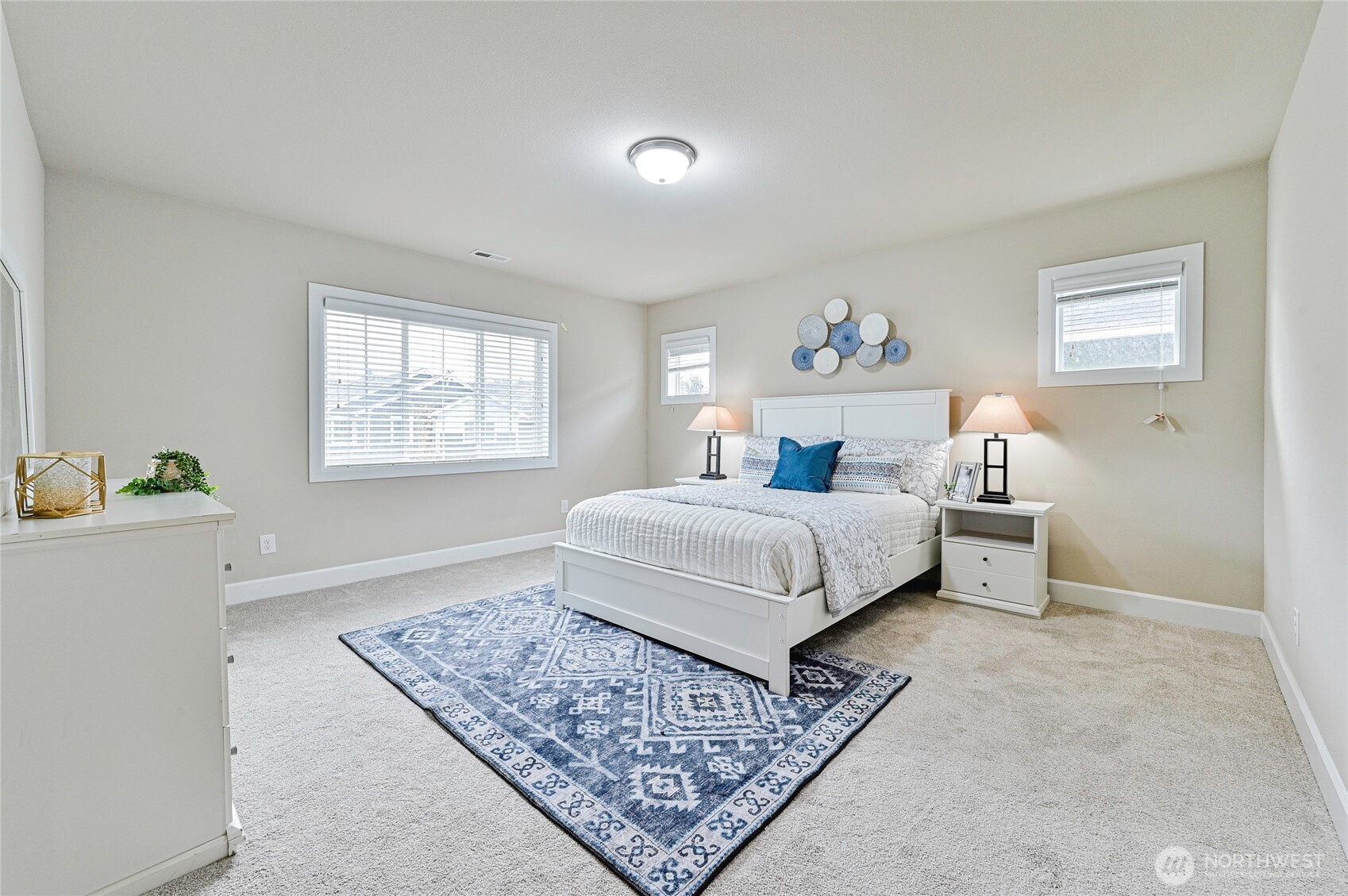 17312 40th Avenue Southeast Bothell, WA 98012 - Photo 19 of 34 a bedroom with a bed and a window