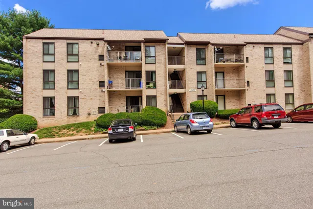 a car parked in front of a building