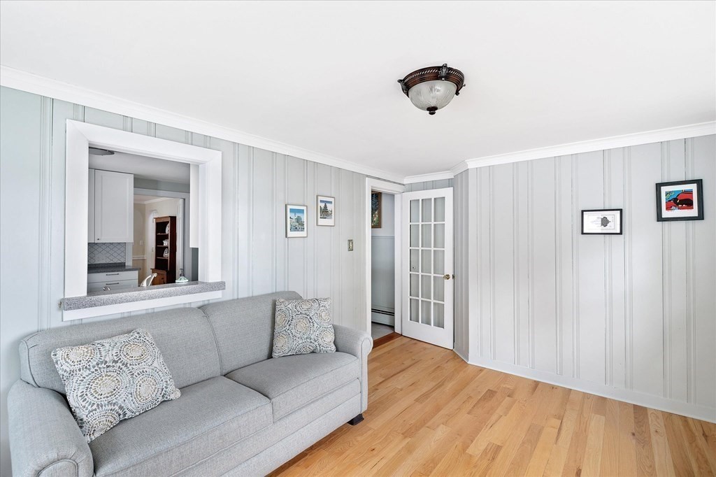 5 West Sutton Road Sutton, MA 01590 - Photo 15 of 36 a living room with furniture and a ceiling fan